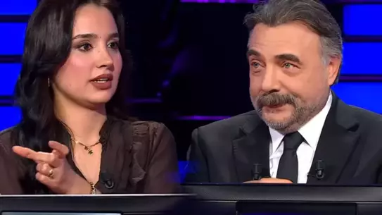 Oktay Kaynarca ve yarışmacı