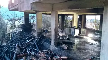 Yangın sonrası söndürülmüş odunluk bölümü