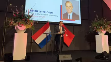 TDBP logosu ve Amsterdam silüeti