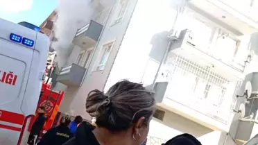 Yangın içinde yatalak adam ve kedisi