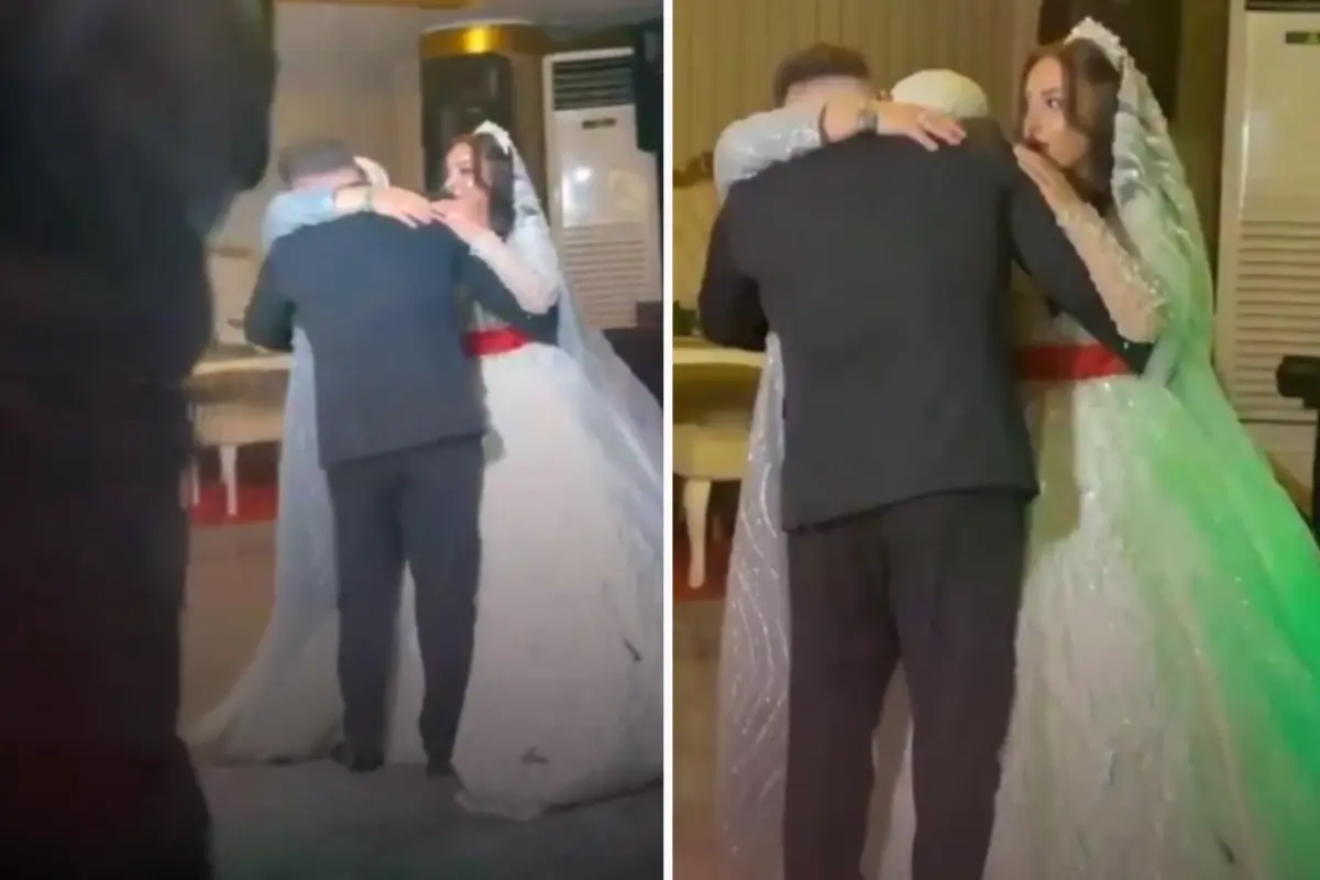 Düğün dansında anne ve damat sarılıyor