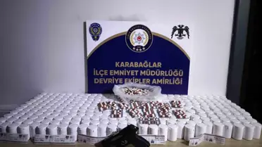 İzmir Karabağlar’da Dev Operasyon: 17.460 Hap ve Çeşitli Silahlar Ele Geçirildi