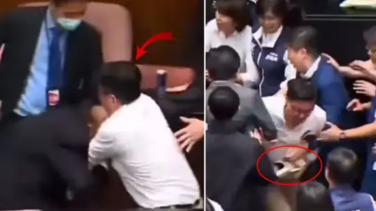 Tayvan Meclisinde Şok An: Milletvekili Tasarısını Alıp Salona Kaçtı
