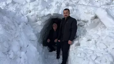 Kar tüneli içinde geçen bir araç