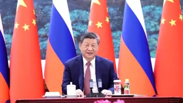 Xi Jinping ve Putin online toplantı ekran görüntüsü