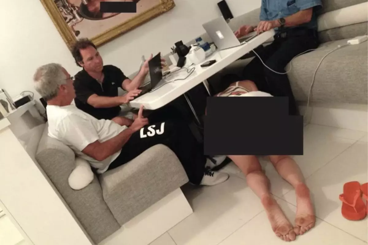 Skandal Fotoğrafın Ayrıntıları: Masanın Altındaki Bikinili Kadın ve Çıplak Bebek Çizimi