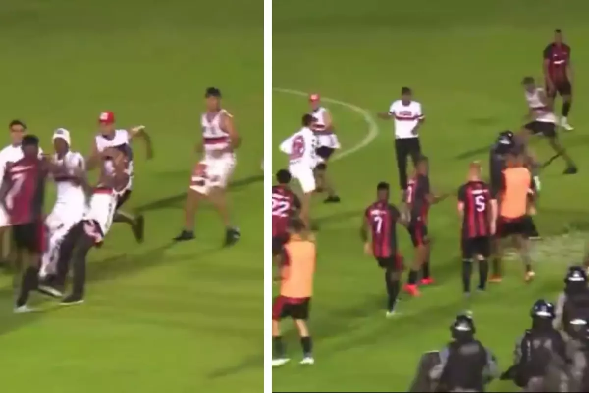 Sahaya giren taraftarlar ve futbolcular arasında yaşanan kavga