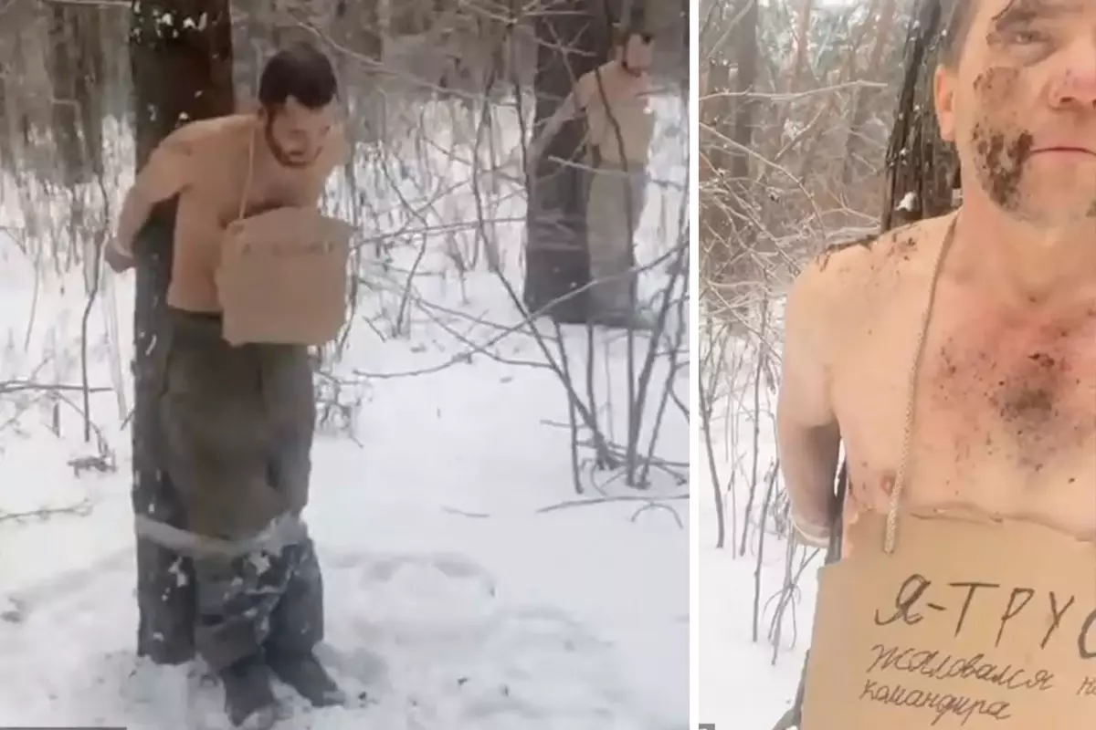 Rus komutanın askerleri ağaçlara bağlama görüntüsü