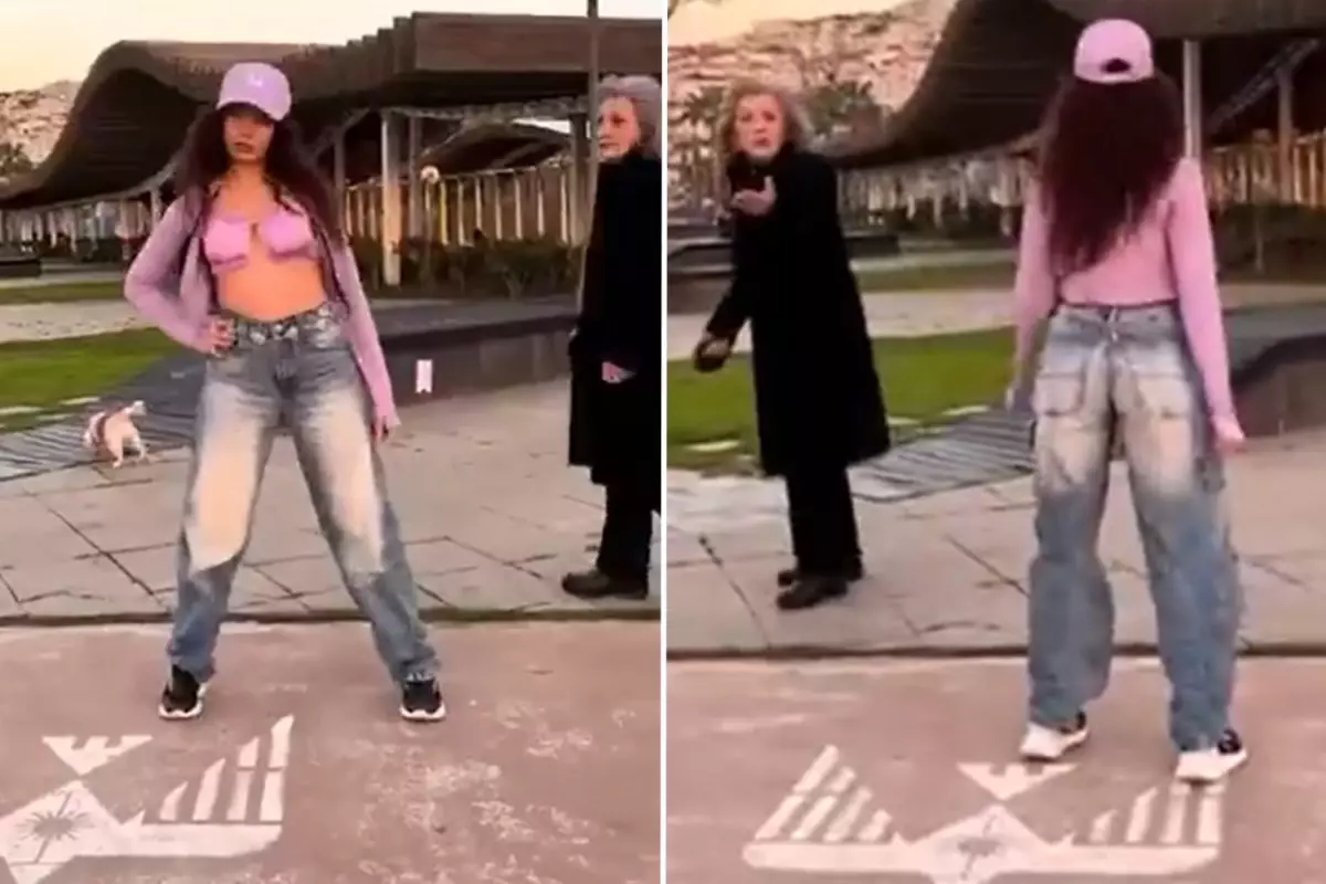 İzmir sokaklarında kışın dans eden genç kız