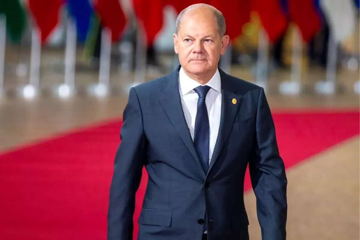 Olaf Scholz ve Philippa Sigl‑Glöckner