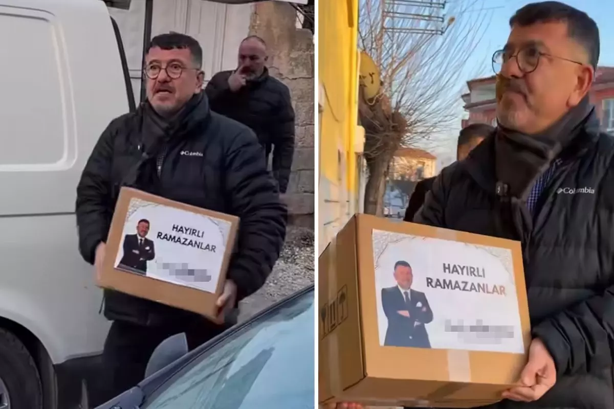 Veli Ağbaba yardım kolileri dağıtımında