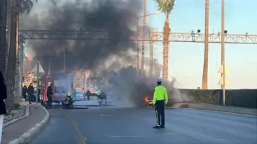 Alevler içinde kalan otomobil