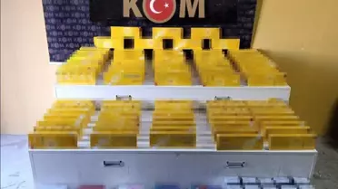 Operasyonda ele geçirilen kaçak sigara paketleri