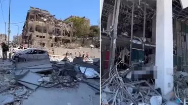 Yıkılmış bina ve yanmış araçlar