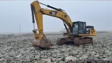 Vinçle kurtarılan traktör