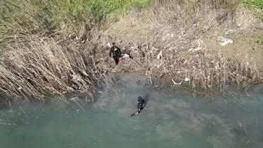 Arama ekiplerinin şelale çevresinde çalışması