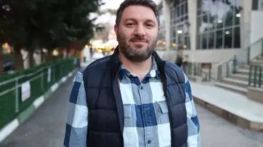 Heimlich manevrası uygulayan antrenör ve çocuğu