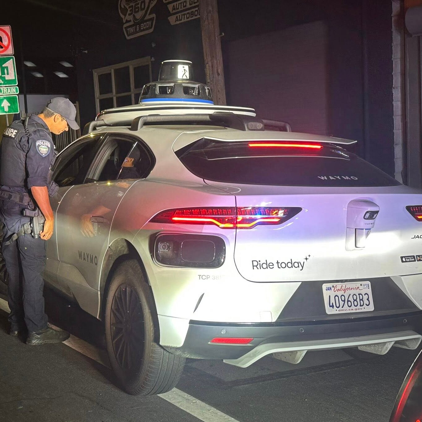 When a Driverless Car Makes an Illegal U-Turn, Who Gets the Ticket?