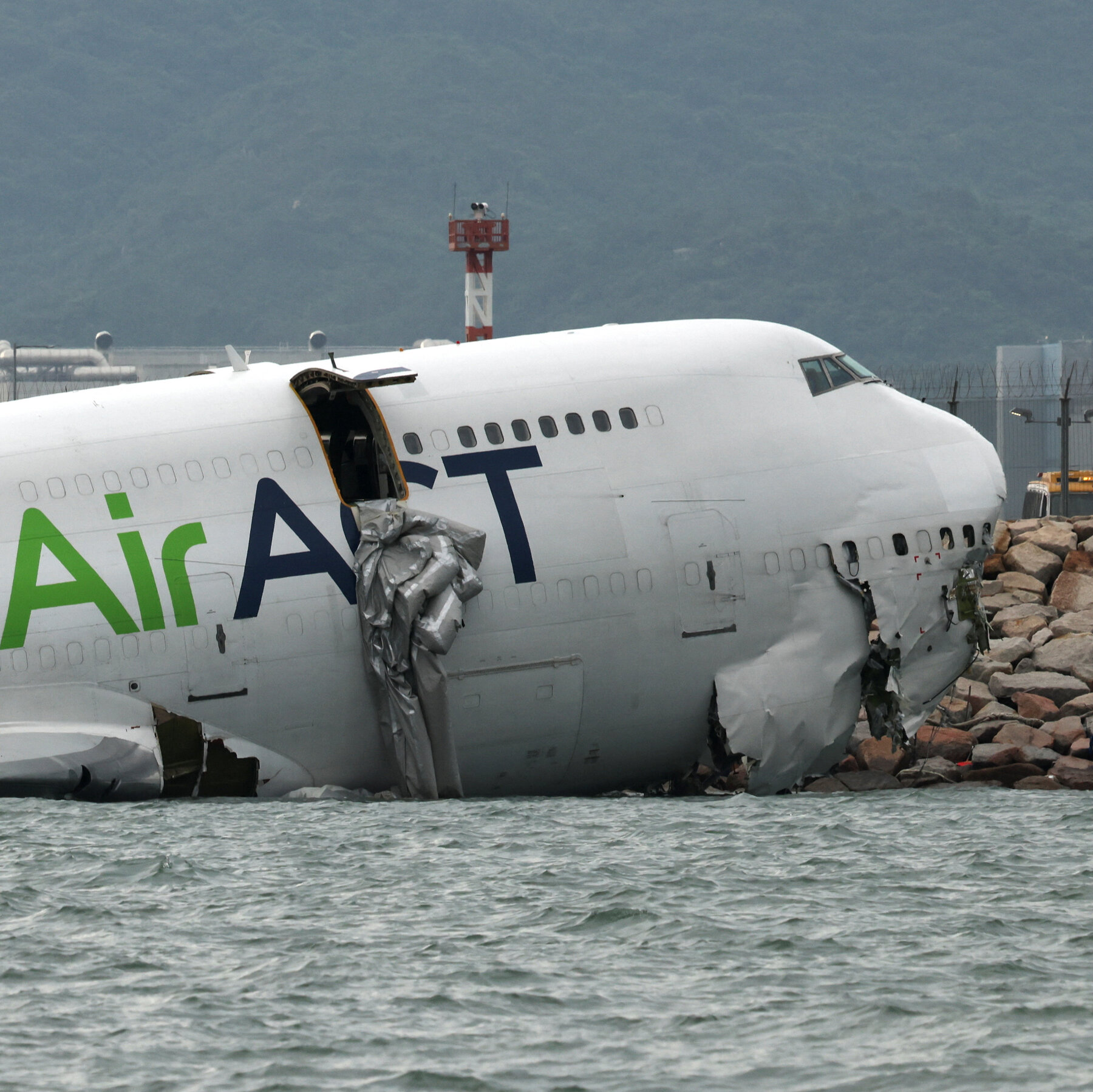 Emirates Cargo Plane Crashes into Sea Off Hong Kong Runway, Claiming Lives of 2 Ground Crew