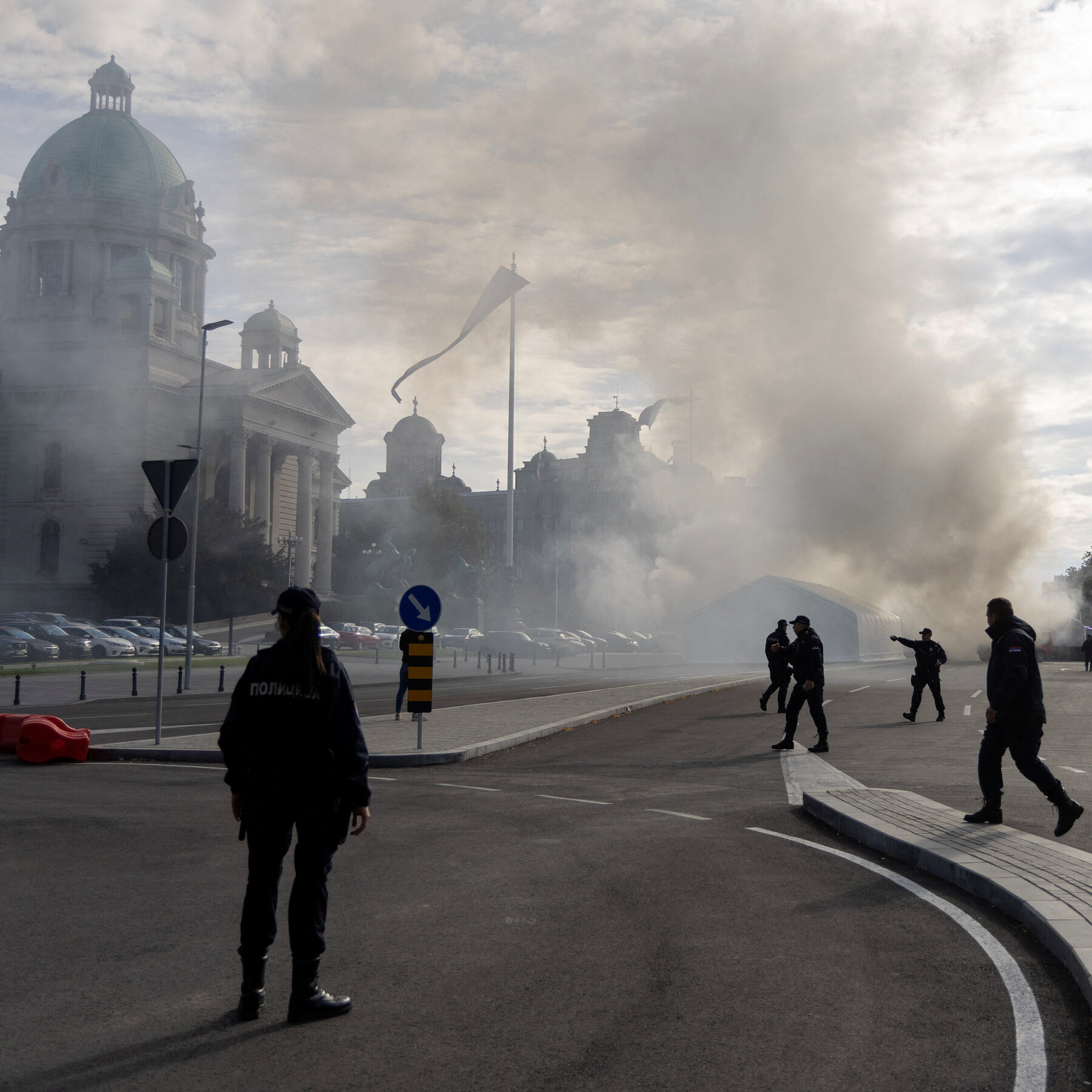 Violence Erupts Outside Serbian Parliament: Man Shot and Protest Tents Set Ablaze