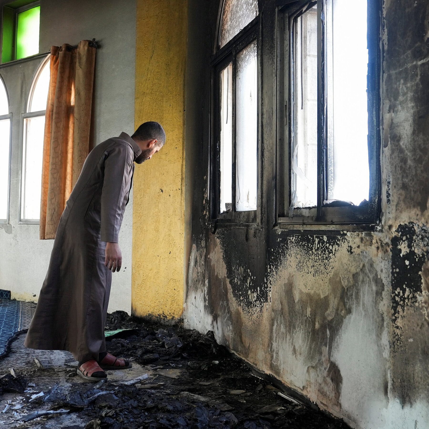 Israeli Settlers Set Fire to West Bank Mosque as Violence Escalates