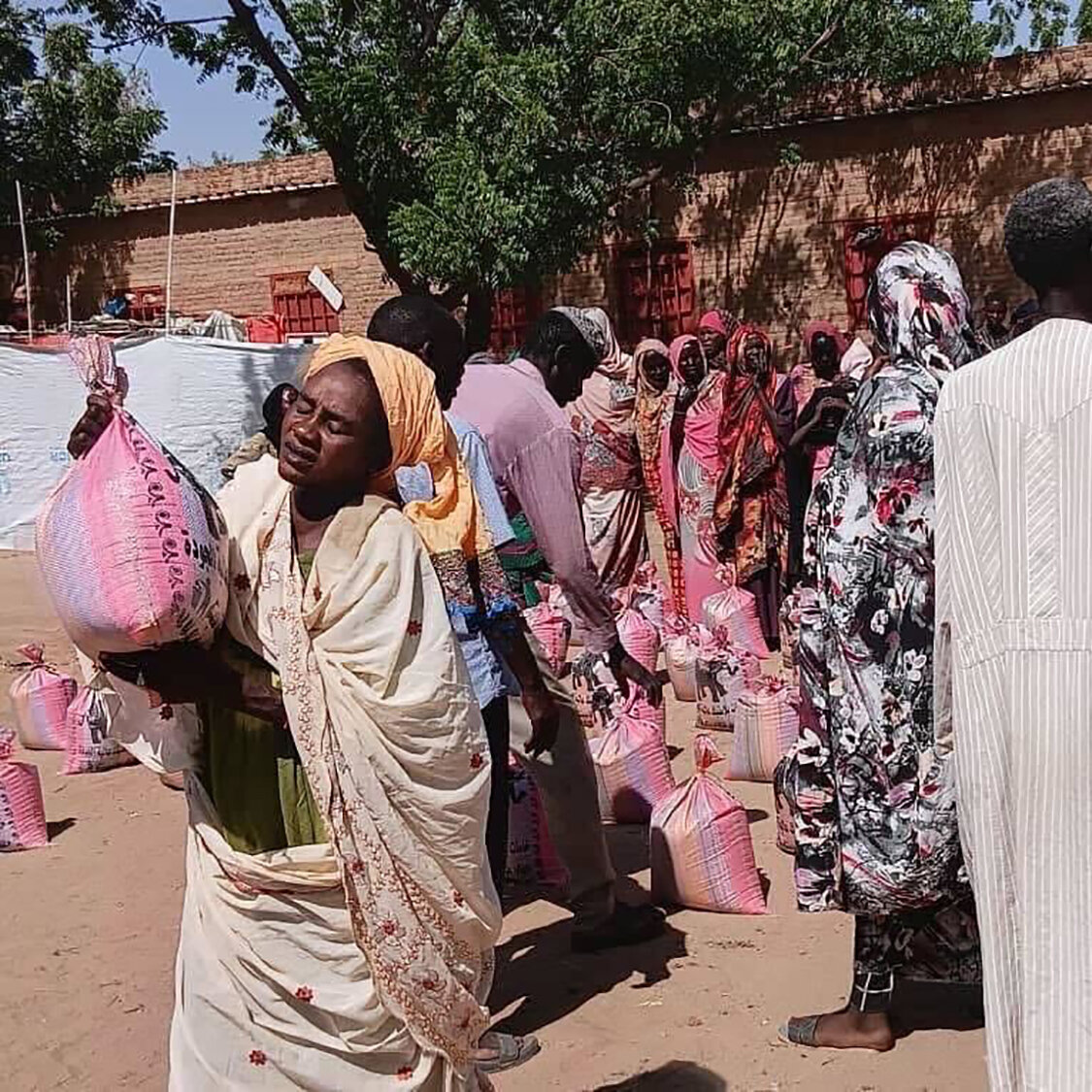 A Trickle of Aid Reaches a Captured, War‑Ravaged City in Sudan